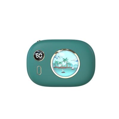 China New hand warmer camera hand warmers charging treasure digital display temperature control double-sided heating usb mobile power bank for sale