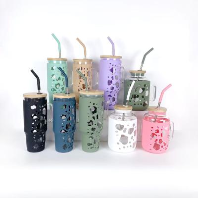 China 40oz glass tumbler 32oz 40oz Glass Tumbler With Handle and SS Straw glass Can with Scale Silicone Sleeve for Summer Large Capacity Cup for sale