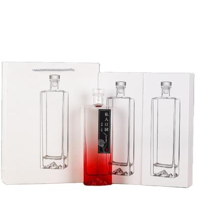 China Beverage Factory wholesale bottom mountain shape liquor glass spirt bottle 500ml 700ml 750ml whisky vodka glass bottle with glass cap for sale