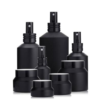 China Chinese Manufacturer Cosmetic Cheap Price Black Spray Essential Oil Bottles Shoulder Bottle Set for sale