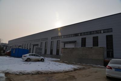 Cina Garage prefabbricato su ordine del granaio del metallo del magazzino della struttura d'acciaio in vendita