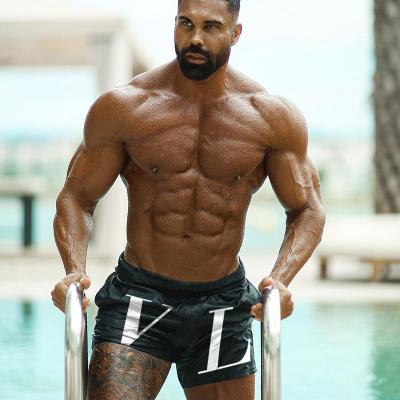 China 2022 Summer Viable Men's Beach Shorts Plus Size Sports Shorts Straight Men Quick Dry Shorts for sale