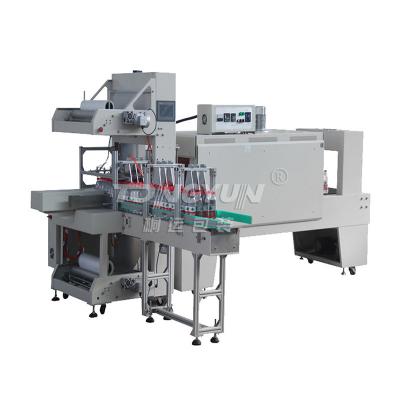 China Food TTM-X01L+TSS-L02 Fully automatic cuff (integral) shrink packaging machine for sale