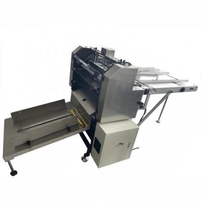 China GLTPZD-600 Automatische Wandkalender Metalen IJzeren Clip Rand Binding Sluiting Hoge Snelheid Werkende Machine Te koop