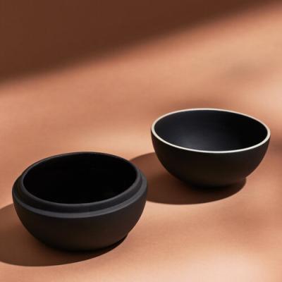 China Viable Wholesale Unique Design Kitchenware Matte Black Spherical Condiments Seasoning Pot Ceramic Spice Jar For Salt Sugar for sale