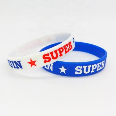 China All Personalized For Youth Balls Sports Team Ink Injected Silicone Wristband Custom Logo debossed fill Rubber Bracelet for sale