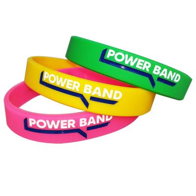 China All Personalized Carving WristBand debossed fill Rubber Bracelet Custom Logo Promotion Ink Injected Silicone Wristband for sale