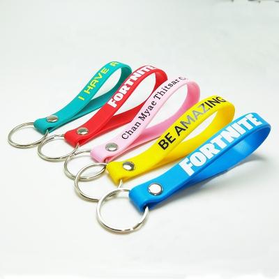 China All Personalized Ink Injected print embossed Custom Logo debossed fill Rubber bracelet glow Silicone Wristband key for sale
