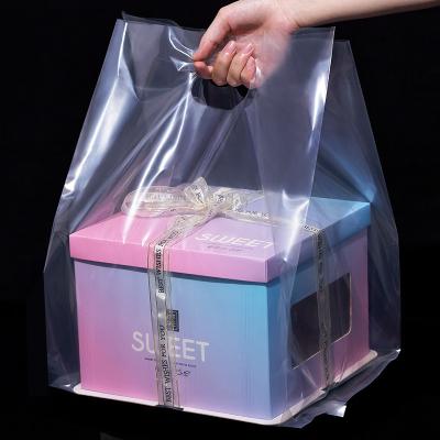 China Recyclable 50pcs Pack Transparent Plastic Bag With Handle Large Food Container Packaging Bag for 6/8/10inch Cake Wrapping Bags for sale