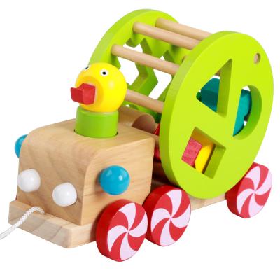 China Wooden Shape Wisdom Duck Pulling Cart Toy Matching Wooden Educational Toys for sale