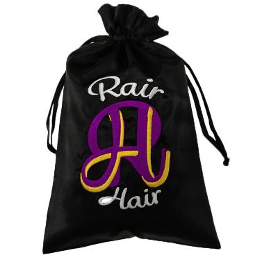 China El regalo negro del lazo del paño del bolso del pelo del terciopelo empaqueta con el logotipo bordado en venta