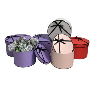 China Handmade Wholesale Luxury Preserved Flowers Round Gift Boxes With Lid Luxury Chocolate Packaging Cardboard Rose Flower Cap Gifts Box for sale