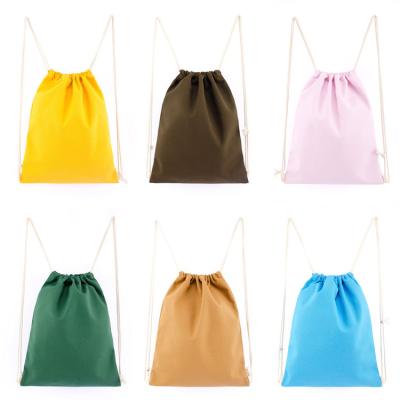 China Cotton Reusable Natural Color Cheap Natural Color Canvas Bag Travel Backpack Custom Drawstring Bags for sale