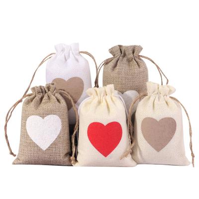 China Reusable Natural Pouch Mini Candy Jute Packing Bags Burlap Jewelry Travel Storage For Gift Bag Natural Jute Drawstring Gift Bag for sale