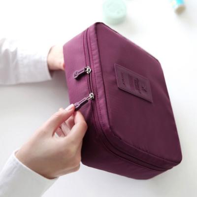 China Large Size Durable Eco-Friendly Washable Craft Black Stain Cosmetic Bags Tyvek Make Up Bag for sale