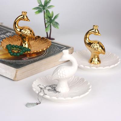 China Nordic Jewelry Tray Home Gift Ornaments Gold Storage Jewelry Necklace Ceramic Plating Tray for sale