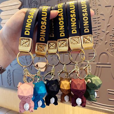 China Wholesale 3D Cartoon Animal Car Pendant Dickmon Couples Bag Doll Charm Animation Resin Cute Dinosaur Keychains for sale