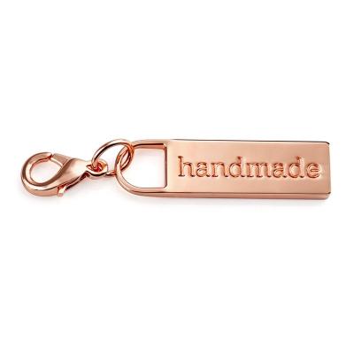 China Custom Bag Accessories Eco-Friendly Zipper Puller With Logo Rose Gold Metal Engraved Zipper Puller With Small Clasp For Apparel for sale