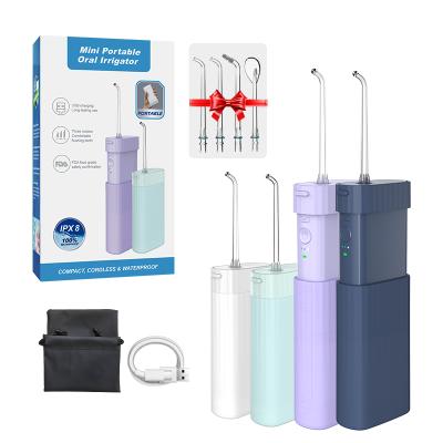 China 2021 Car Mini 3 Speed Mode IPX7 Irrigator Top Rank Portable Oral Making For Travel Trip for sale