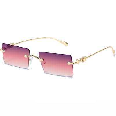 China Trendy Rimless Colored Sun Glasses Rectangle Fashion Sunglasses One-Piece Delivery Fashion Sun Glasses For Women Male for sale