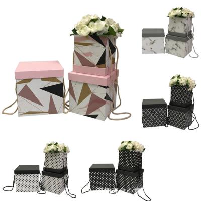 China Recycled Materials Spots Wholesale Square Wave Dot Flower Square Box Barrel Embrace Flower Box Geometric Portable Wedding Box Three Sets for sale