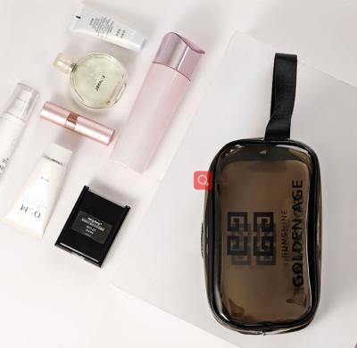 China Custom Clear Transparent Large Capacity Travel Luggage Pouch PVC Travel Toiletry Bag Make Up Cosmetic Bag for sale
