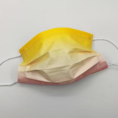 China Breathable Disposable Unisex Gradient Colored Spunlace Melt-Blown Face Mask for sale