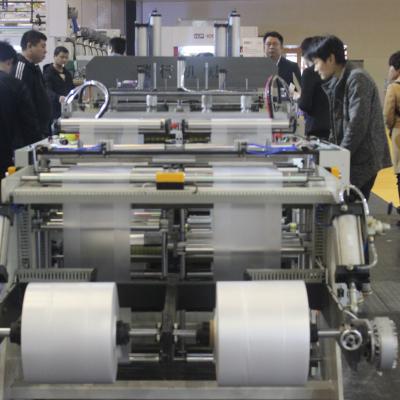 China High Speed Automatic T Shirt Hotels Two Lines Bag Making Machine for sale