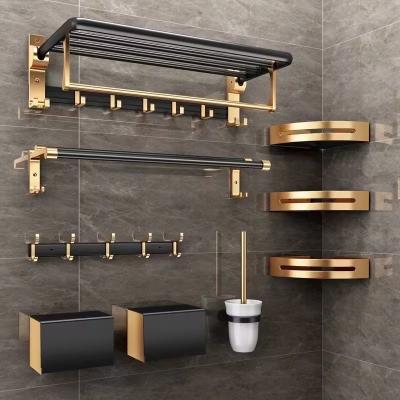China Durable Aluminum Folding Storage Rack Hardware Accessories Set Black And Gold Towel Rack Shelf Bathroom Products for sale