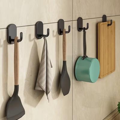 China Clothing Hanger Heavy Duty Sticker Strong Adhesive Stainless Steel Wall Mounted Towel Hooks Black Hook for sale