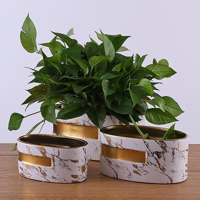 China European Modern Decorative Flower Pot Planter Gold Flower Pot Ceramic Planter for sale