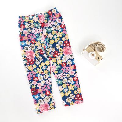 China Anti-wrinkle kids tight pants boys and girls soft leggings pants kids boys camouflage pants kids cartoon printed pants for sale