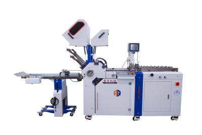 China AOQI Máquina plegable de alimentación de succión de carga continua con carpeta de succión de aire para automediador en venta