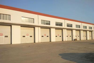 China Hoge snelheid industriële sectiedeuren veilig 40 mm geïsoleerd sandwichpaneel Te koop