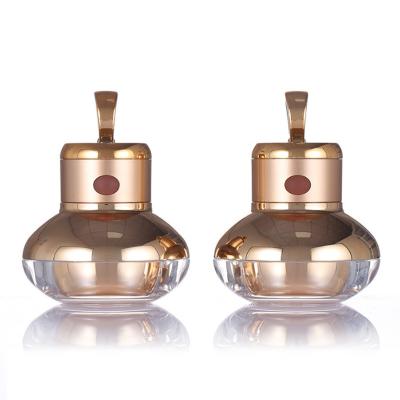 China OEM golden skin care cream bottle round plastic vibration cream bottle 30g for sale