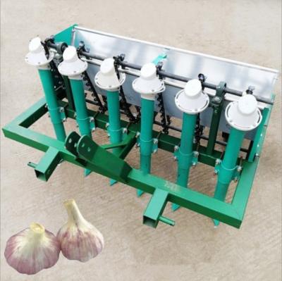 China 3 POINT HITCH TRACTOR 4 ROWS GARLIC AND POTATO PLANTER WITH FERTILIZER for sale