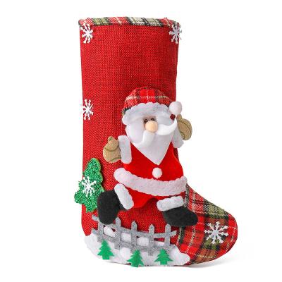 China Eco-Friendly KERVINO Linen large Christmas stockings fence Christmas gift bag Christmas tree hanging candy bag decorations for sale