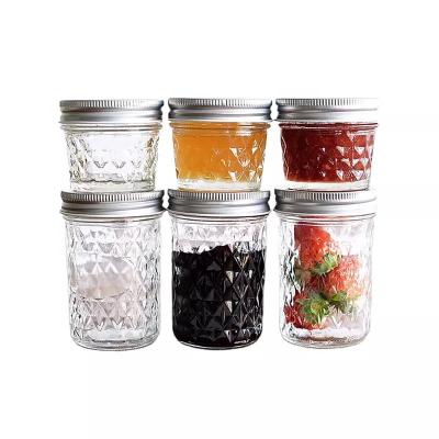 China Sustainable Clear Borosilicate Food Canister 16oz Caviar Honey Jar Glass Jam Pickles Bottle Empty Wide Mouth Mason Jar with Lid for sale