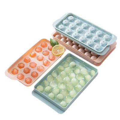 China Sustainable Whiskey Household Food Grade Ice Cube Round Tray 36 Grids Diy Silicone Mold Ice Cream Molds With Lid for sale