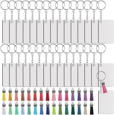 China Anime Free Sample Sublimation Blank MDF Double Sided Art Or Key Chain For Heat Press Transfer for sale