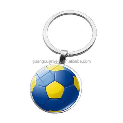 China Wholesale Custom Glass Souvenir Half Soccer Ball Image Colored Key Chain for sale