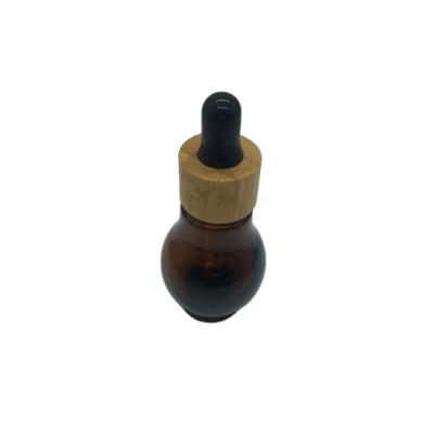 China Personal care 20ml bamboo dropper glass amber bottle for essential oil for sale
