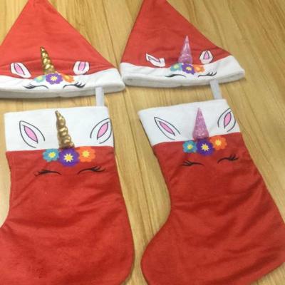 China New Products Eco - Friendly Custom Plush Christmas Santa Hats And Christmas Stockings For Adults Christmas Gifts for sale