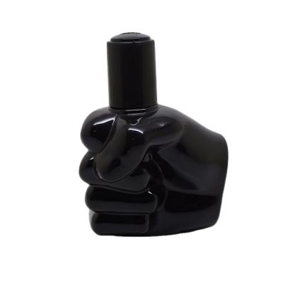 China A3256-55ML custom personal care make a fist shape empty glass perfume bottle with plastic cap for sale for sale