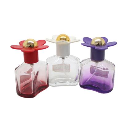 China Personal Care A2650-20ml Flower Shape Cap Pocket Empty Perfume Spray Glass Bottle 2021 Years Hot Sale for sale