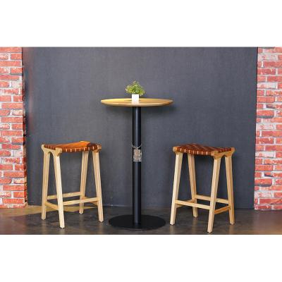 China Modern Bar Chair Hotel Home Furniture Manufacturer Solid Wood Horse Saddle Wood Frame Leather Woven Bar Stool for sale