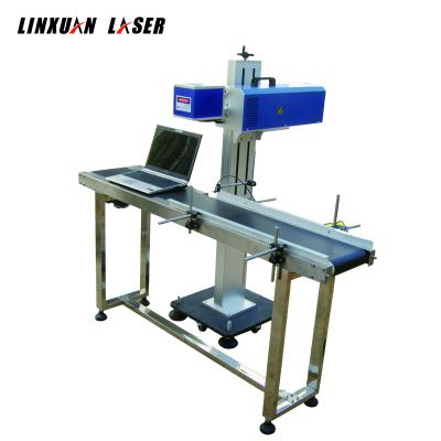 China Online Laser Fiber Food Packaging Bags Flying Laser Marker CO2 Laser Marking Machine for sale