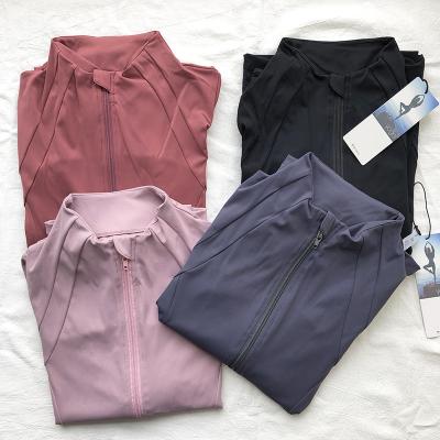 China Breathable Slim Fit Long Sleeved Fitness Coat Yoga Crop Tops With Thumb Holes Gym Jacket Workout Sweatshirts for sale