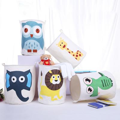 China Cute Cartoon Nursery Basket Canvas Laundry Basket Large Storage Basket Minimalist Folding Round Waterproof Basket for sale