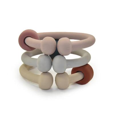 China Custom Eco-Friendly Silicone Sensory Wooden Baby Teether Teething Toy Ring for sale
